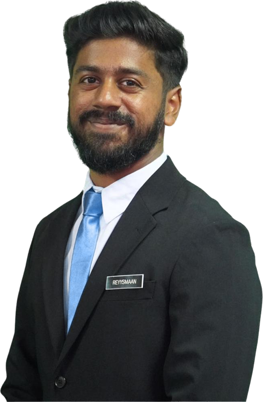 Mr Reyy, Reyysmaan Avuddaiyar, smiling in a black suit and blue tie